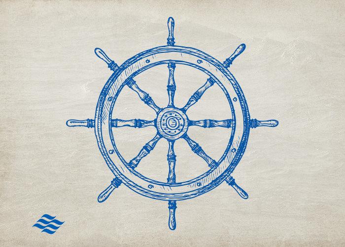blue wooden ship wheel on parchment paper textured background