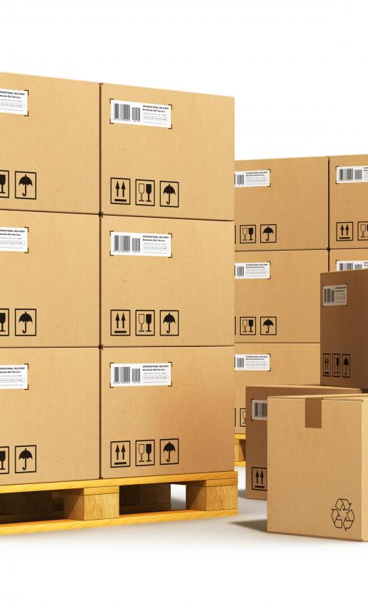 Freight boxes piled on and around a wooden pallet.