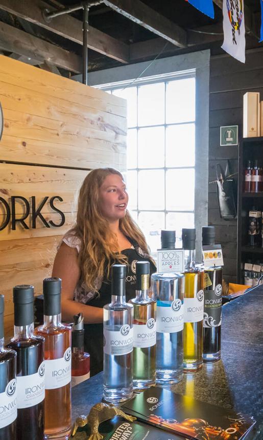 Visitors sample drinks at Ironworks Distillery in Lunenburg.