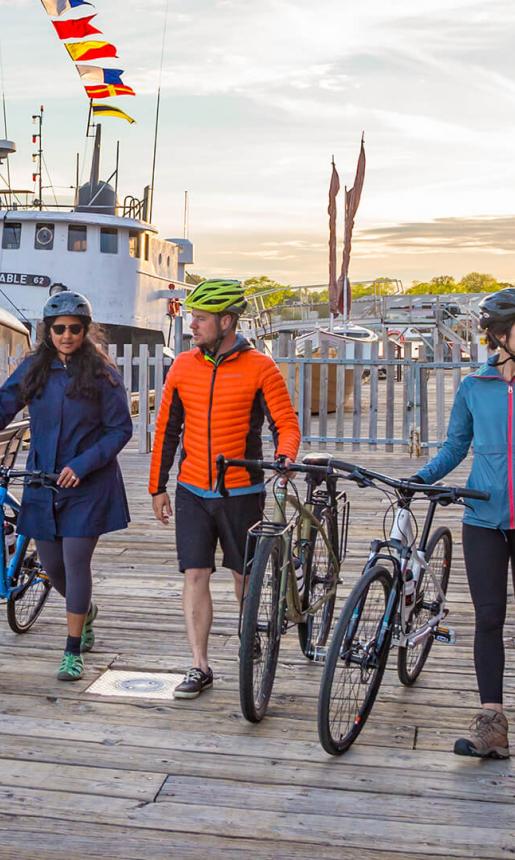Group of Cyclists on Boardwalk