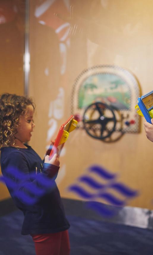 Kids playing in the toddler area